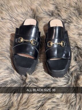 Black Slide Mules with Gold Horsebit Detail